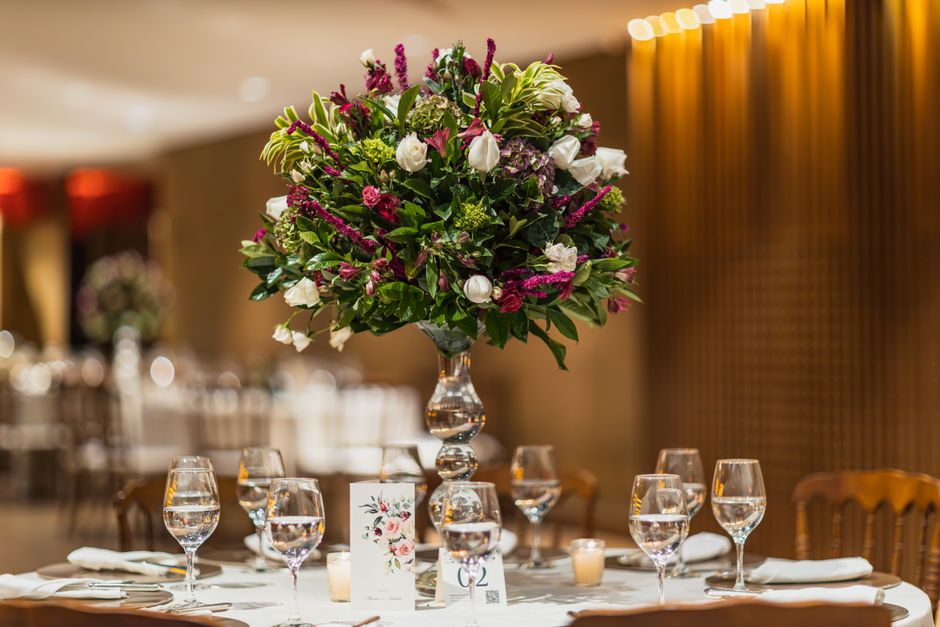 Elegant floral table centerpiece for full-service wedding planning